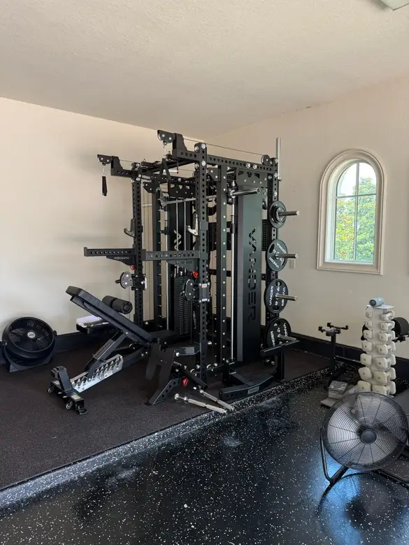 Functional trainer rig assembled in a home gym